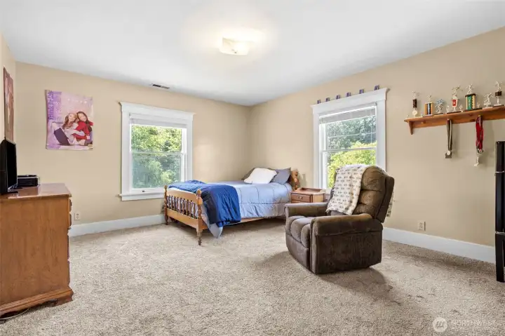 Bedroom 3 offers generous space for both sleeping and relaxing, with plenty of room for a comfortable sitting area.