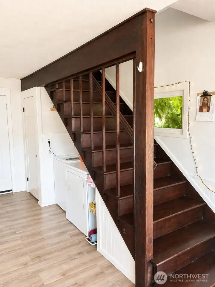 The repurposed staircase adds charm and personality, reflecting the resourcefulness and history found throughout the property.