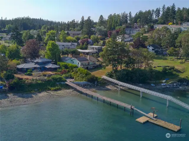 Private dock leading to your private compound with main house, guest house, studio, and more!