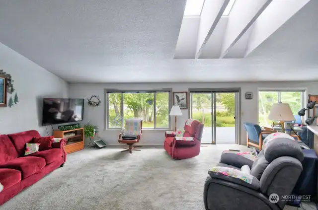 Large open concept living room as you walk in the entry area.