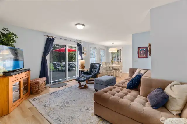 Nice lounge, den space with slider to patio and backyard