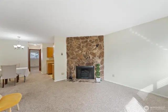 Living room opens to Dining / Kitchen.