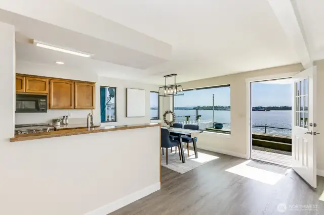Open & airy, the kitchen looks out to the water.