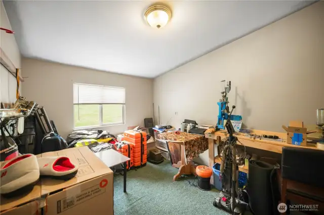 inviting office space attached to the primary bedroom with a view.