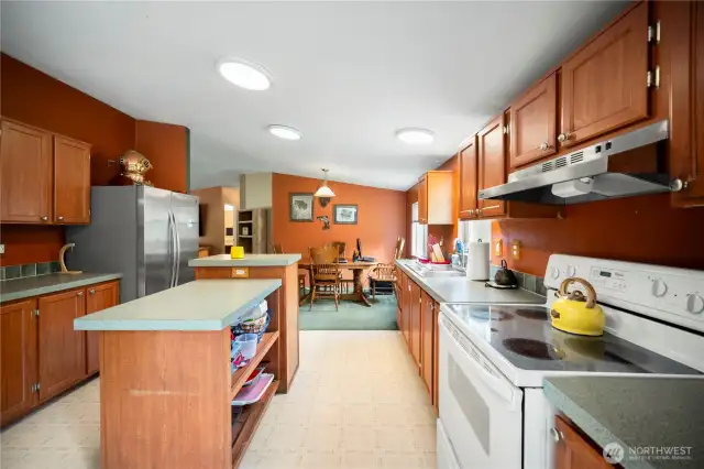 Prepare gourmet meals in this chef-inspired kitchen. The hummingbirds come right up to the window over the sink.