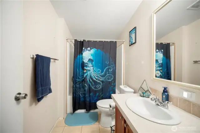 2nd full bathroom on the far end of the home, with the 2nd bedroom + 2 extra finished rooms.