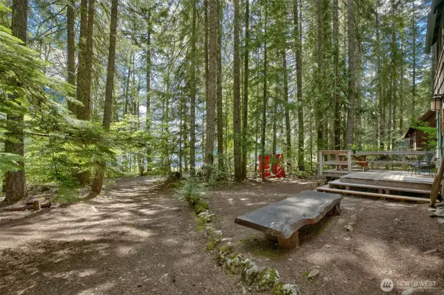 Front of Cabin with Views of Lake Beyond - Parking at Distant Left