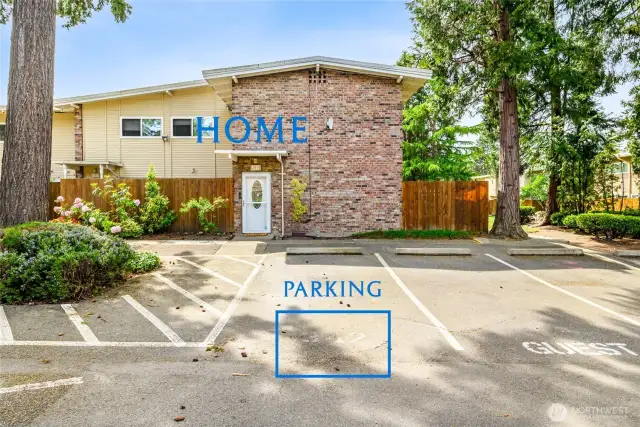 The unit comes with three parking spaces, one assigned right in front of the unit. There are plenty of guest parking spots right next to it.