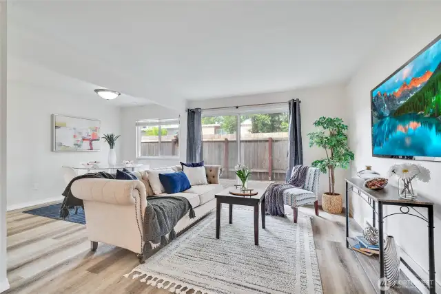 Another view of the cozy living and dining from the entrance.