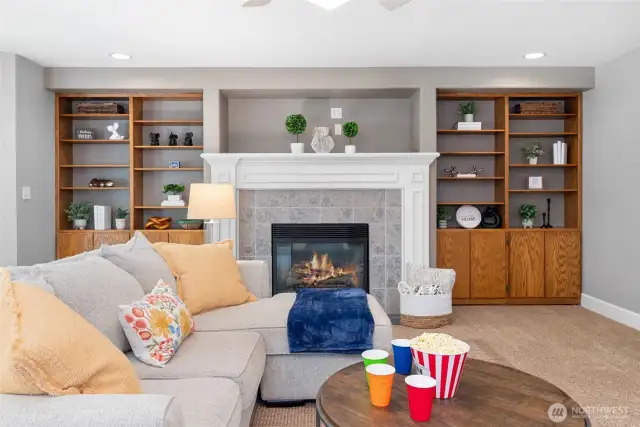 Check out those bookshelves! I challenge you to fill them. How lovely it will be to cozy up with a good book and a fire on demand. Throw in some popcorn and life is great!