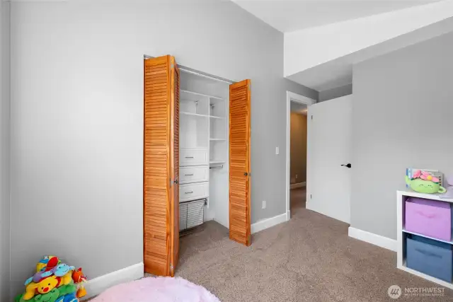 This room also features vault ceiling and California closet system.