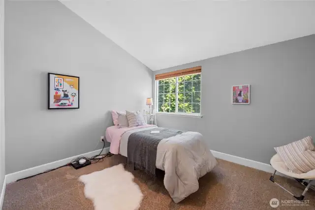 Next we turn and venture over toward the primary suite. Along the way, we find bedroom #3.