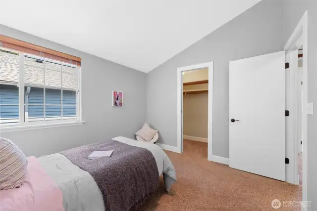 This room features vaulted ceiling and walk-in closet. Perfect for your little prince, princess, or guests.