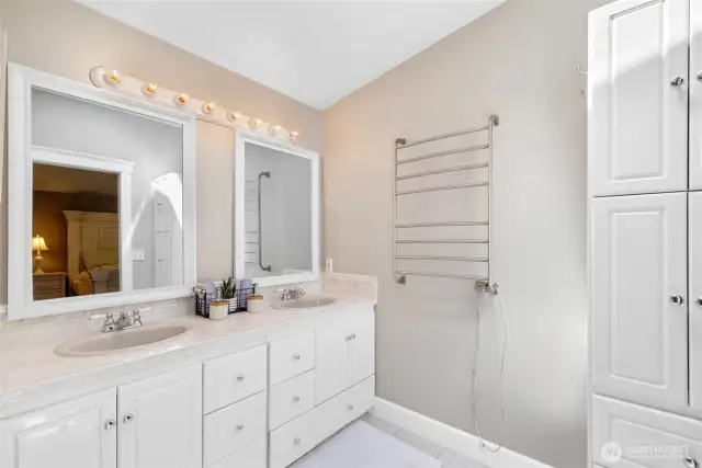 HEATED TOWEL RACK! WooHoo, it stays! Also included is a linen closet. :)