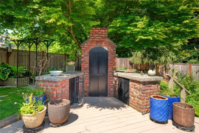 This lovely space provides a quaint outdoor kitchen/fireplace space that is plumbed for gas. It iss not currently connected and has not been used by the currently owners.