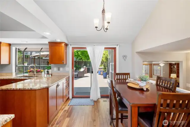 Having a quick bite or just an informal meal? Enjoy it in the nook. Centrally located allowing you to see almost the entire lower level of the home and outside.