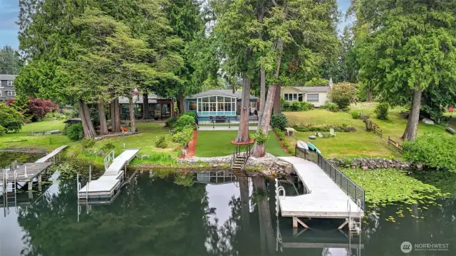 Spring fed Haller lake is 15 acres with fishing, small electric motors boats, paddle boarding and swimming.  There is also a park on the other side of the lake.  Your own dock with 2 ladders and and set of stairs.
