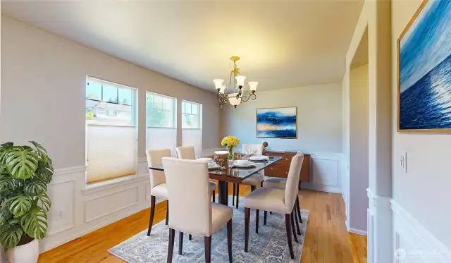 Bright and elegant formal dining room filled with natural light from large windows. Photo is virtually staged.