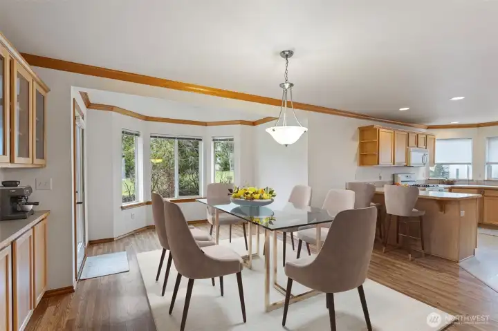Lots of cabinetry and closet space for storage and bay window in the dining room. Virtually staged.