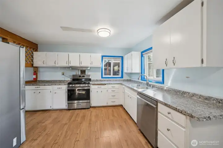 Kitchen from other entrance by the bedrooms and bathroom.
