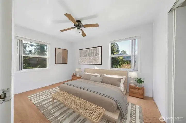 Bedroom on main level. (virtually staged)