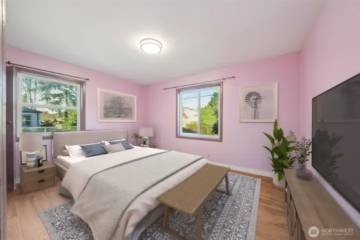 2nd bedroom on main level. (virtually staged)