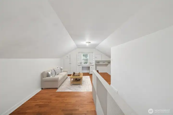 Landing at top of the stairs can be used as a 4th bedroom or office. Plenty of storage nooks. (virtually staged)