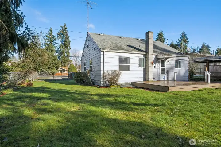 Enjoy the yard with room for parking your RV or trailer through the gate.