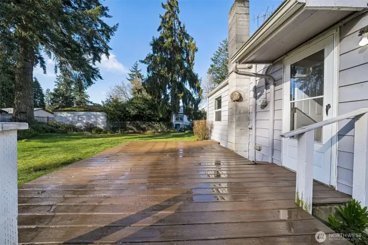 Entertain on the deck with a wonderful yard.