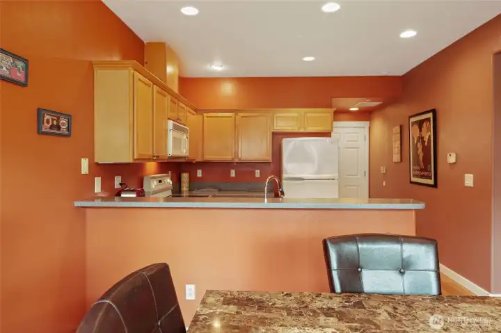 Hallway to large two-car garage - easy access from bringing in groceries!