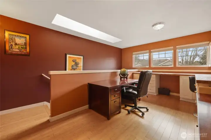 Look at all the built-in storage and under-cabinet space for seating!