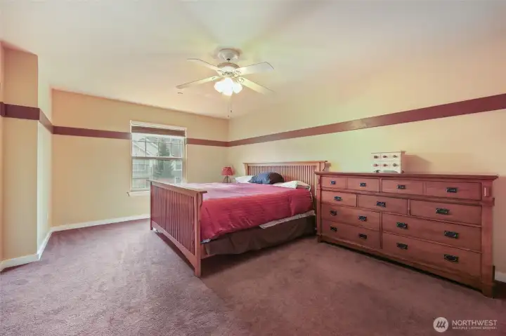 Huge Primary Suite - not only large square feet footprint, but oodles of wall space for additional bedroom furniture or desk!