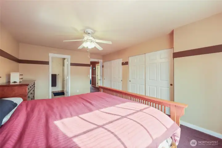 Easy access to hallway, two closets, and large primary bath!