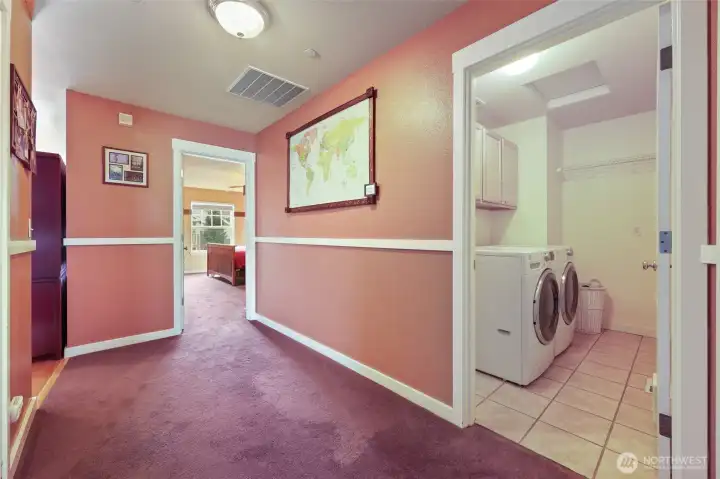 Large utility/laundry room adjacent to bedrooms and baths - perfect location as this is where majority of clothing & linens are generated!