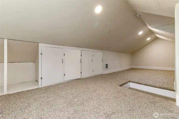 Upstairs is spacious for potential 3rd bedroom, storage, playroom, den or...