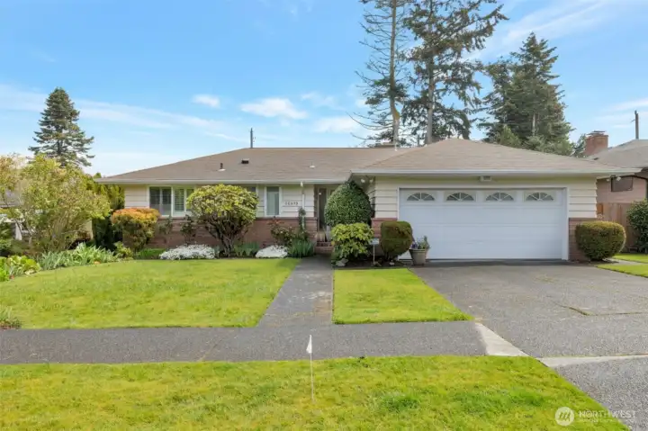 Street view, curbs and sidewalks in this very walkable neighborhood.