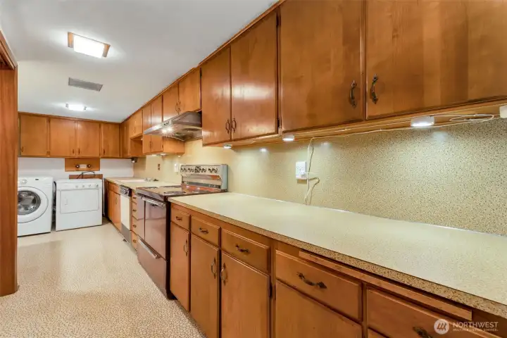 Second kitchen lower level, features double oven and no shortage of space.