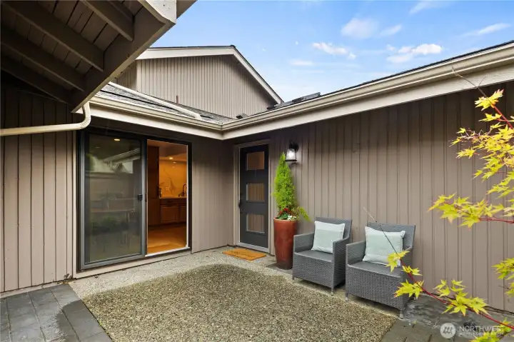 Private gated entry enhances the home’s single-family feel