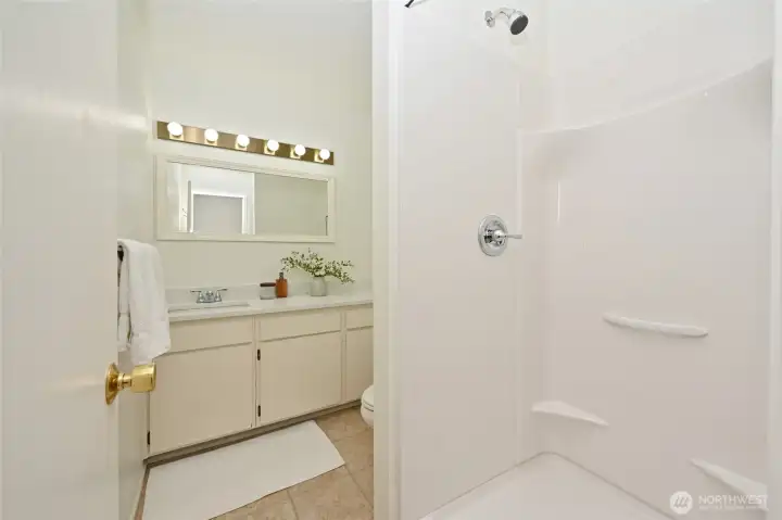 Shower insert and vanity recently refreshed.