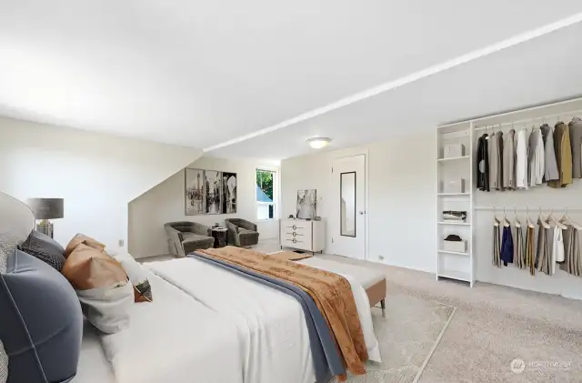 The primary bedroom has a small walk-in closet behind the mirrored door in addition to the open closet seen in this photo.