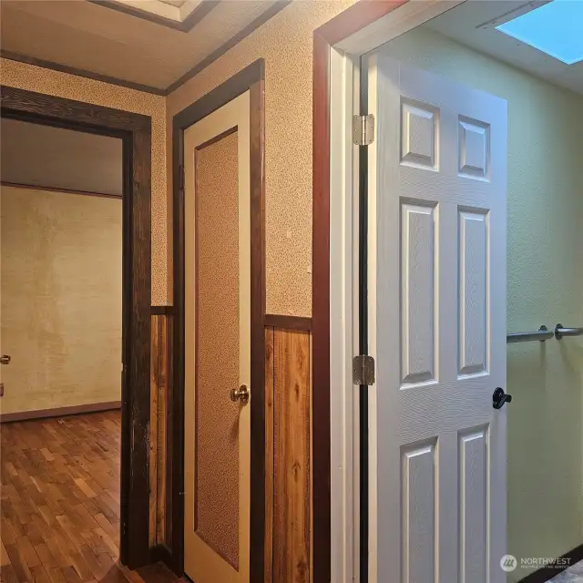 Bathroom and bedroom entrance with linen closet