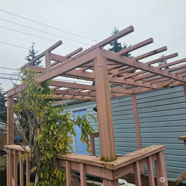 pergola off of the shop perfect for summer relaxing and gardending