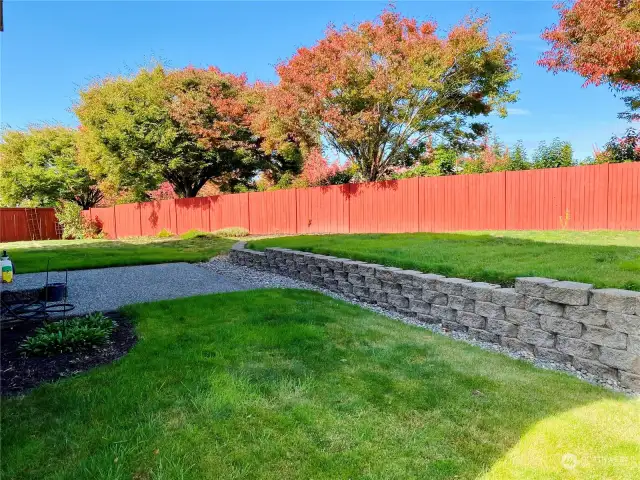 Large, fenced backyard.