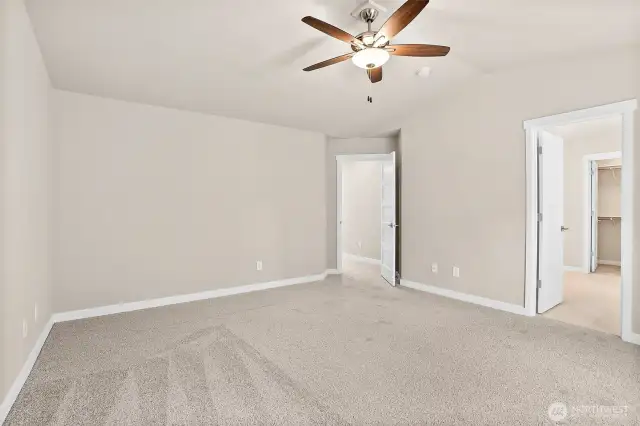 Ceiling fan included in primary. Home under construction, photo for illustration only.
