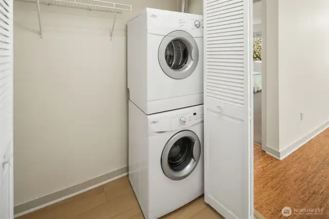 A washer and dryer off the kitchen provide extra convenience, with additional closet space available for all your utility storage needs.