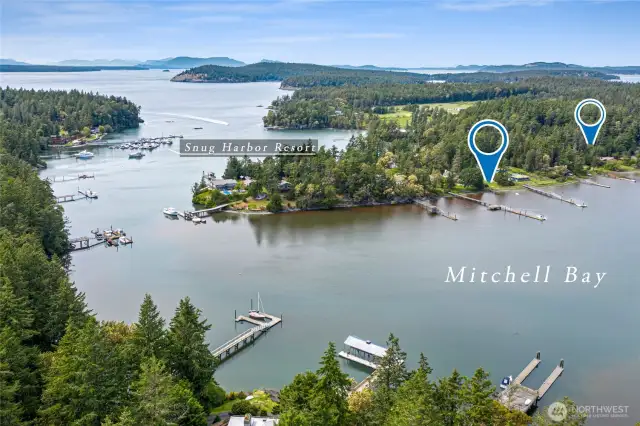 This photo shows the location of the waterfront home and vacant lot.