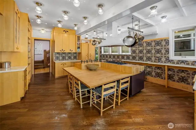A chef’s dream with sleek Onyx countertops, a La Cornue French range, and heated floors for year-round comfort.