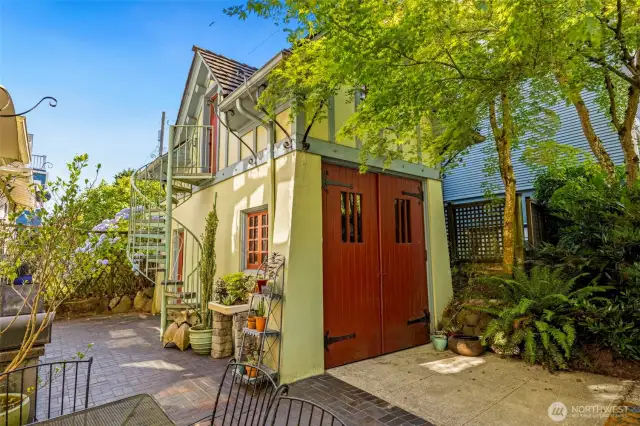 A charming guest house situated above the detached garage, providing private and flexible living space.