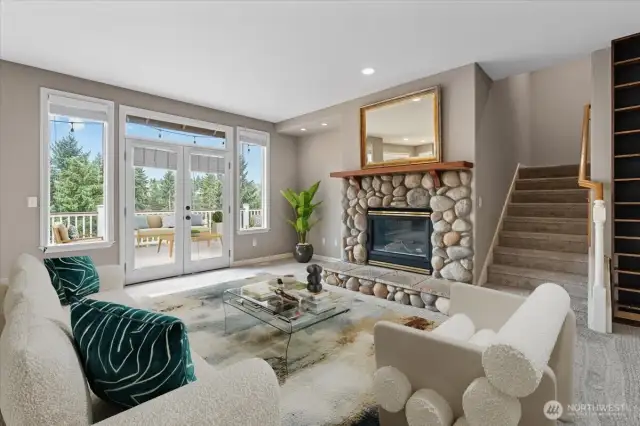 Open and spacious living room with gas fireplace (virtually staged)