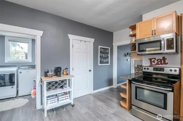 The laundry is just off the kitchen keeping every day chores steps away and noise away from the living and sleeping spaces.